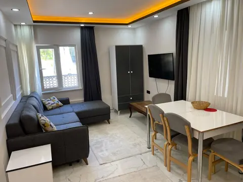 3 No'lu daire — modern aydınlatmalı oturma alanı